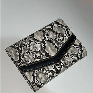 Madison West Snakeskin Clutch with Black Trim